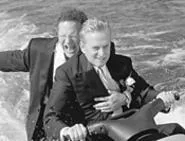 Michael Douglas and Albert Brooks ride hard for the - laughs in The In-Laws.
