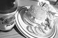 Mind your Manners: The Boulevard's behemoth burgers might remind you of days gone by. - WALTER NOVAK