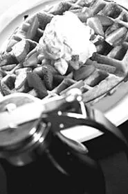Mom's waffle is a crispy golden-brown on the outside - and custardy on the inside. Yum. - WALTER NOVAK