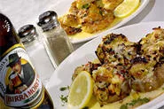 Mushroom caps (front) and Shrimp D'Agnese score with the help of lemon-butter sauce. - WALTER NOVAK