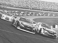 NASCAR race cars were among the purchases the - alleged con artists made.