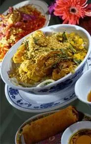 New to the neighborhood: Spring roll, banh sougnh, and pad thai. - WALTER NOVAK