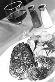 Nostalgia, ambiance, and entres like the black pepper - strip steak make John Q's a perennial draw. - WALTER NOVAK