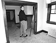 Pat McNamara inspects the latest damage. "I'm angry. - Thieves are taking the one thing we have to offer." - WALTER NOVAK