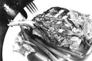 Pork chops don't get much better -- or bigger -- than - the honey-bourbon version at McKenna's. - WALTER NOVAK