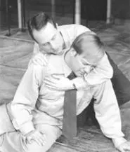 Robert (top) demonstrates his delicate gay sensibility - on Jeffrey.