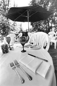 Sapphire's outdoor dining room, well hidden from the - bustle of Solon. - WALTER NOVAK