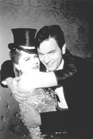 Satine and Christian belt out a - turn-of-the-next-century hit.