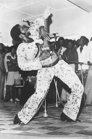Sir Victor Uwaifo shows Jimi Hendrix how it's done.