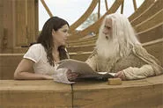 Steve Carell reads Lauren Graham a hot-off-the-press sacred text.