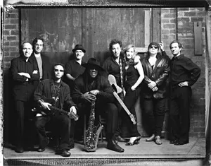 The Boss, his wife, and a bunch of guys he makes music with.