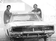 The Duke boys: Luke (Johnny Knoxville), Bo (Seann - William Scott), and the General Lee.