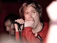 The (International) Noise Conspiracy's Dennis Lyxzn, at the Grog Shop December 18. - WALTER NOVAK