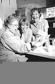 The three gal pals at The Spitfire Grill share a - laugh over a cup of coffee and some mustard.