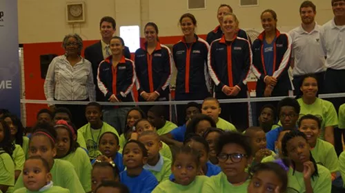 The U.S. FedCup team with the children of the Inner City Tennis Clinic