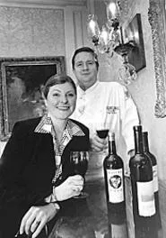 Toast of the town: Marianne Frantz of the Cleveland - Wine School and Chef Terry Menear of the - Ritz-Carlton. - WALTER NOVAK