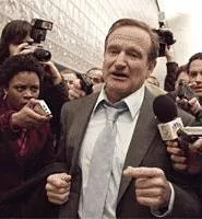 Tom Dobbs is a loose cannon, played with restraint by Robin Williams.