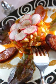 Tuscan white-bean salad entices the eye with its radish ring. - PHOTO BY WALTER NOVAK