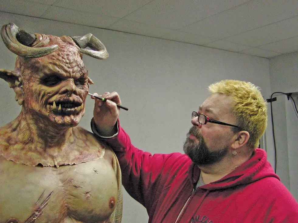 Tuskes puts the finishing touches on a monster.