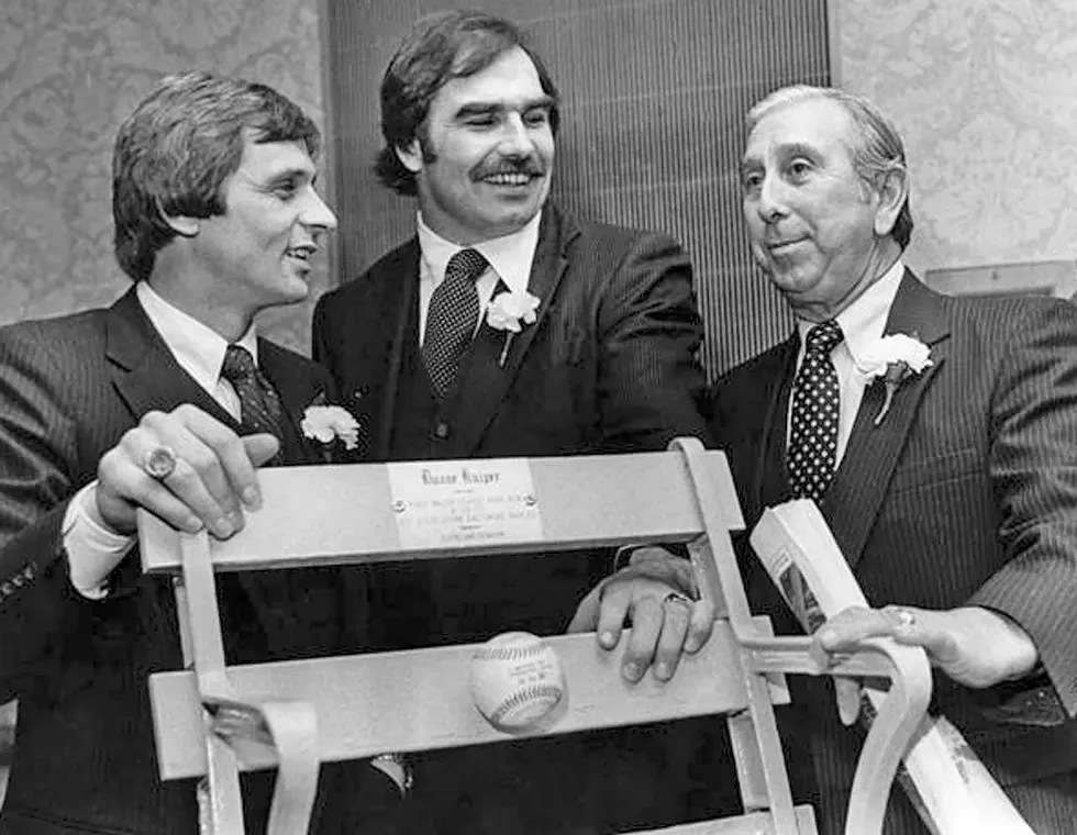 Duane Kuiper, left, Doug Dieken, and Tribe manager Dave Garcia, right, stand by the stadium - seat presented to Kulper in honor of his only Major-League home run. - PHOTO COURTESY OF CLEVELAND MEMORY PROJECT
