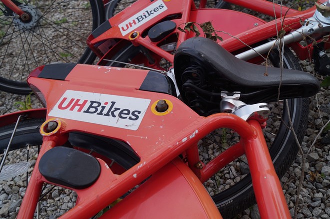 The UH Bikes graveyard across from Rivergate Park, (7/30/19). - SAM ALLARD / SCENE