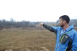 Vic Giaconia points out the proposed Nexus route, which would run alongside his property line.