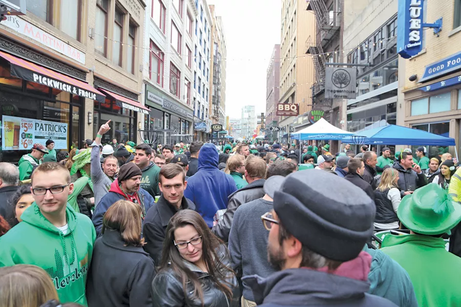 A crowd gathers for the downtown parade. - PHOTO BY EMANUEL WALLACE