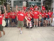 "We bring people together, whether they remember it or not," says Brian Saracusa, Dean of Awesome (center). - JOE P. TONE