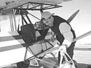 With the ban on flying over Browns and Indians - games, pilot John Kujda is lucky to have a job. - WALTER NOVAK