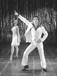 You can tell by the pose, hes in Saturday Night - Fever.