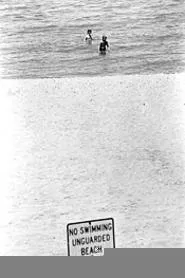 Young swimmers at Sims Beach, where a pipe releases raw sewage. - WALTER NOVAK