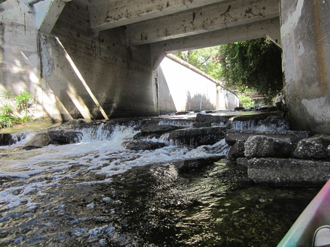 Rapids through the Roser Park neighborhood of Booker Creek. The next great urban whitewater run? - THOMAS HALLOCK