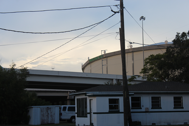 First the interstate, then a stadium. Failed efforts at "urban renewal" loom over the old neighborhood at 16th St. South. - JULIE ARMSTRONG
