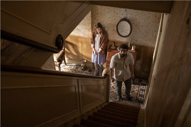 Tomas prepares to go upstairs and check on Magda's mother, who is locked in a room and dying. Trust us, that's not a good idea. - NICK WALL/MAGNET RELEASING