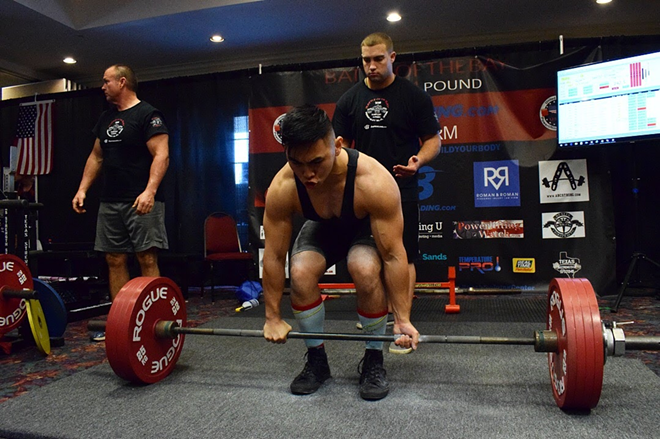 Thong La, 25, has been a competitive athlete since 2017 with the United States Powerlifting Association. He hopes that training will help him compete in The Titan Games. - THONG LA