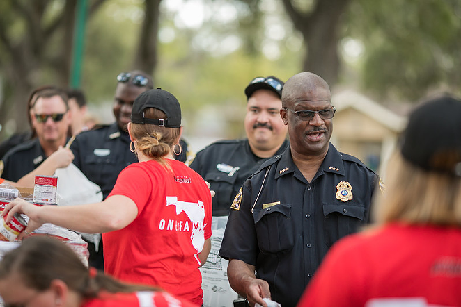 St. Petersburg Chief Anthony Holloway (R) who actually did something after a July press conference where he said his community is ready for a change. - CITYOFSTPETE/FLICKR