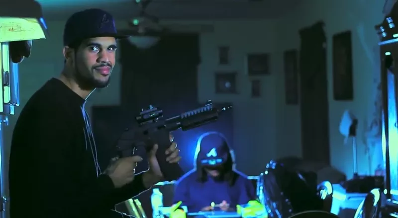 Charles "Mistah Dee" Smith, in a video capture from an eerily prescient rap video in which he nearly predicted the circumstances of his death