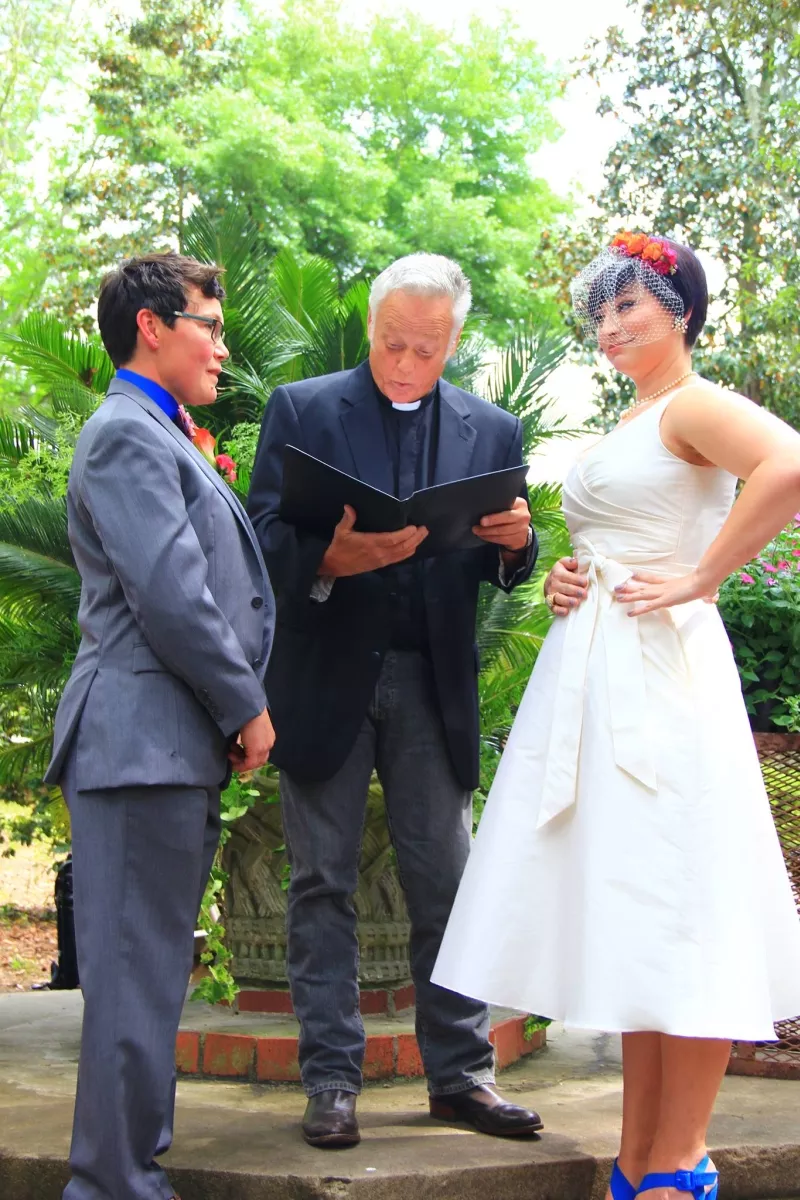 Chela Gutierrez (l.) married Cody Shelley in front of God and everybody in a ceremony presided over by sometimes-minister Roy Wood. - MEGAN DAVIS