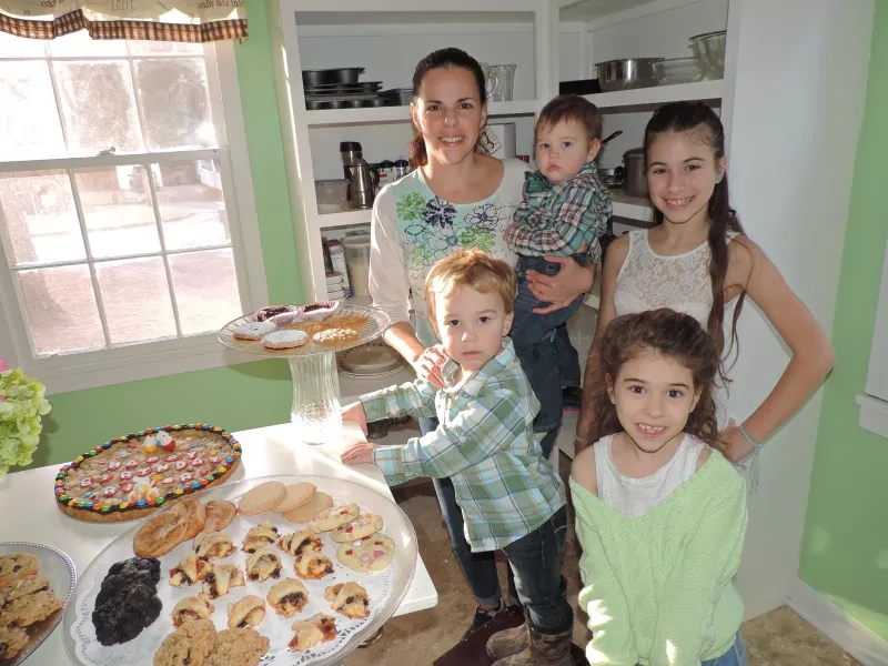 Dawn Ciano Brosh with baby Tristan, toddler Cameron, oldest daughter Daniela (designer of the logo) and her lil’ sis Katerina