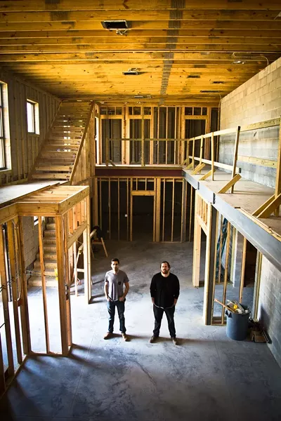 Garage, Inc.: Motlagh, left and Collett, right, in the space’s common area. - JON WAITS/@JWAITSPHOTO