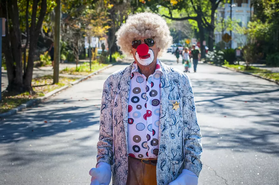 "I do not know him! This of course was shot on St. Patrick's Day—you can see people are walking around in the middle of the street and there are no cars around. But you can see in the reflection of his glasses that there's a lot going on outside the frame."