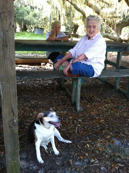 Sandy West in her element on Ossabaw Island; author Jane Fishman sits in the background. - PHOTO COURTESY JANE FISHMAN