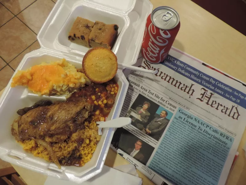 Succulent stewed Turkey wing w/ mac ‘n’ cheese, red rice ‘n’ gravy, okra ‘n’ tomatoes with corn and corn muffin — bread puddin’ on the side.