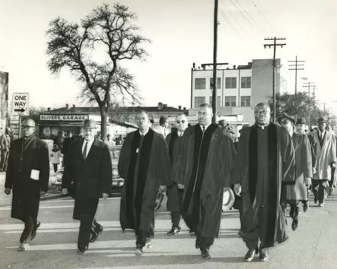 W. W. Law and local pastors lead march in solidarity with Selma to Montgomery marchers down West Broad Street, March 1965. Courtesy of the City of Savannah Municipal Archives.