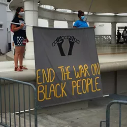 This past weekend’s Enough is Enough Call to Action in Forsyth Park brought ou hundreds of attendees to learn more about what they can do to dismantle systemic racism. Photo by Jim Morekis.