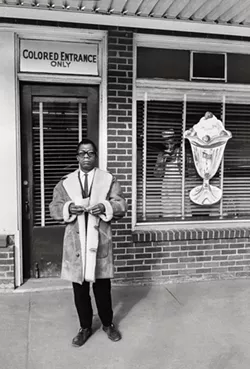 "James Baldwin, Colored Entrance Only, Durham, North Carolina" by Steve Shapiro, 1963. Copyright of the artist and courtesy of Laney Contemporary, Savannah, and Jackson Fine Art, Atlanta.