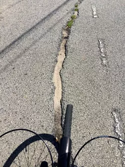 Danger in the bike lane: If your bike’s front wheel becomes stuck in this massive crack in the Lincoln Street bike lane, you’re going to have a bad time.