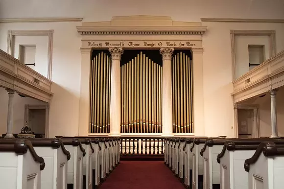 Many a secular celebration has been hosted in the acoustically-perfect sanctuary of Trinity UMC, including The Thursday Night Opry featuring local musicians. - PHOTO BY JON WAITS