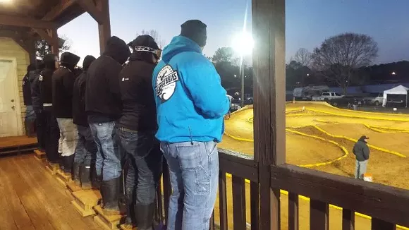 Remote-controlled cars fly over humps and around curves at the 30-year-old Phil Hurd Raceway at Lake Mayer.