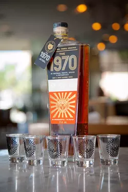 Entrepreneur and local style icon Ikeda Feingold has bottled the vodka-based 1970, a19 ingredient, 70-proof infusion that can enjoyed neat, on the rocks or in a mixed cocktail. - PHOTO BY JON WAITS